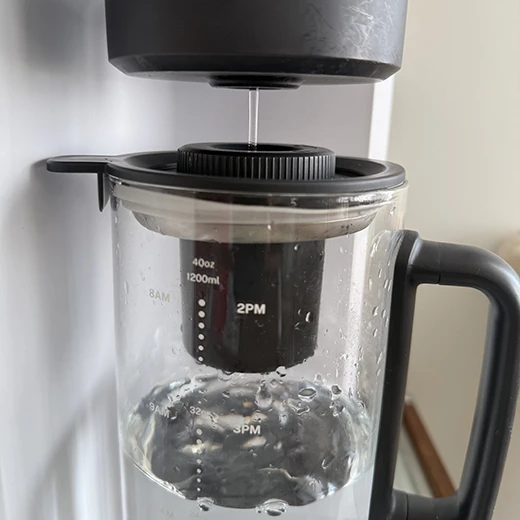 Bluevua Lite RO water filter carafe actively filling with purified water